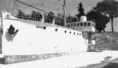 Bakar je bio brod obalne plovidbe sa 346 brt. Prilikom kapitulacije Italije ušao je u sastav NOVJ. Naoružan topovima, krajem rujna 1943. učestovao je u bombardiranju neprijateljskih objekata u omiškoj luci. Otplovio je sa Hvara s grupom teških ranjenika NOVJ, talijanskim vojnicima povratnicima, zbijegom i dva oficira koji su trebali uspostaviti kontakt sa savezničkim komandama u Italiji. Bio je prvi brod koji je pod jugoslavenskom zastavom sa zvijezdom petokrakom koji je uplovio u strane vode (3. listopada u talijansku luku Bari). Neko vrijeme je služio kao brod-baza, sjedište Delegacije NOV i POJ. Održavao je vezu između Visa i drugih djelova slobodne teritorije na obali i otocima s lukama u južnoj Italiji, prevozeći jedinice, zbjeg i ranjenike, te materijalnu pomoć za NOV i POJ. Brod je 1964. godine dobio Orden narodnog oslobođenja. Sačuvan je u Hrvatskom pomorskom muzeju u Splitu (na slici)